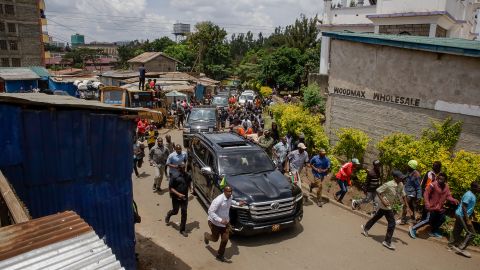 NAIROBI, KENYA - MARCH 13: Presidential escort motorcade arrives in Kibera Slum during Kenya's President Dr. William Rutos visit on March 13, 2025 in Nairobi, Kenya. Kenya's President Dr. William Ruto has visited Kibera Slum in Nairobi, one of the biggest slums in the world, to address locals on a project aimed at transforming the slum into an estate with better living standards. 
 (Photo by Donwilson Odhiambo/Getty Images)