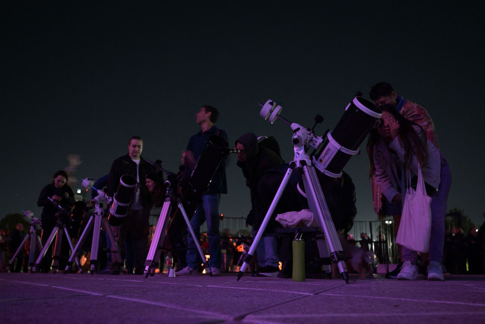 Skygazers watch the lunar eclipse at Galileo Galilei Planetarium in Buenos Aires.