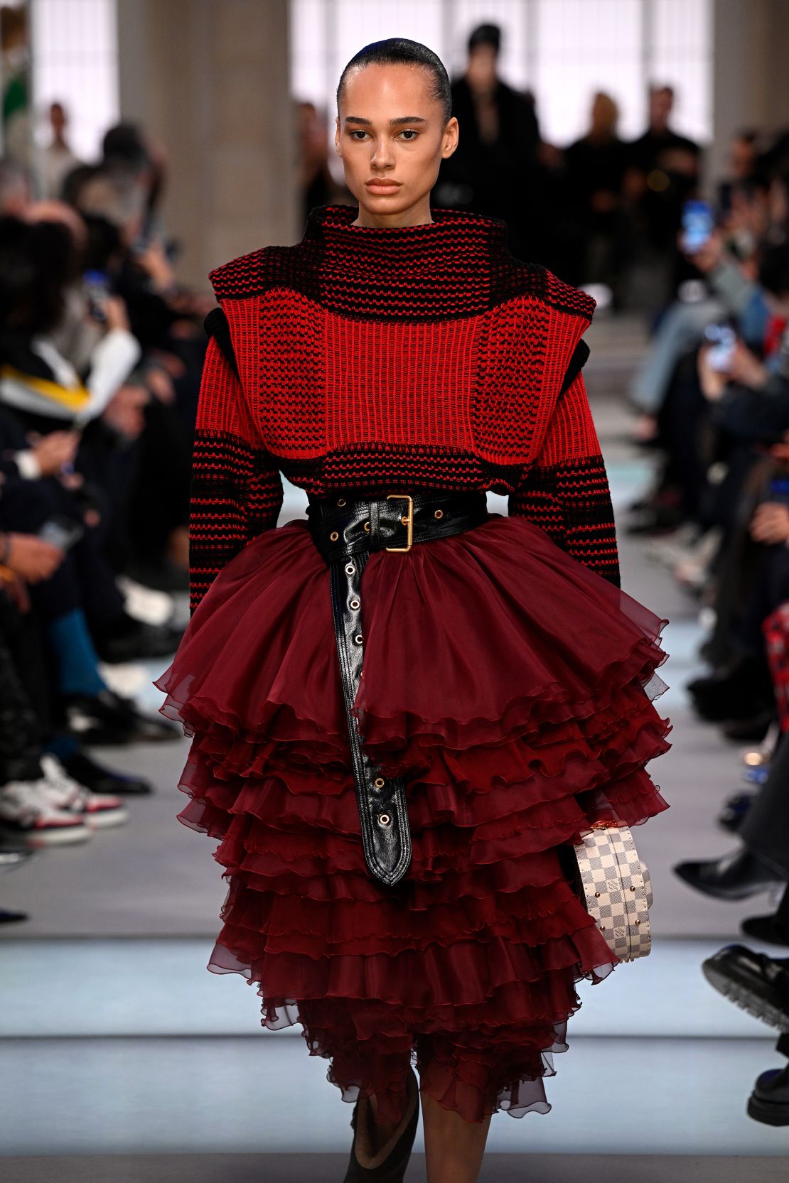 Models strutted down a catwalk just yards away from Paris' Gare du Nord train station.