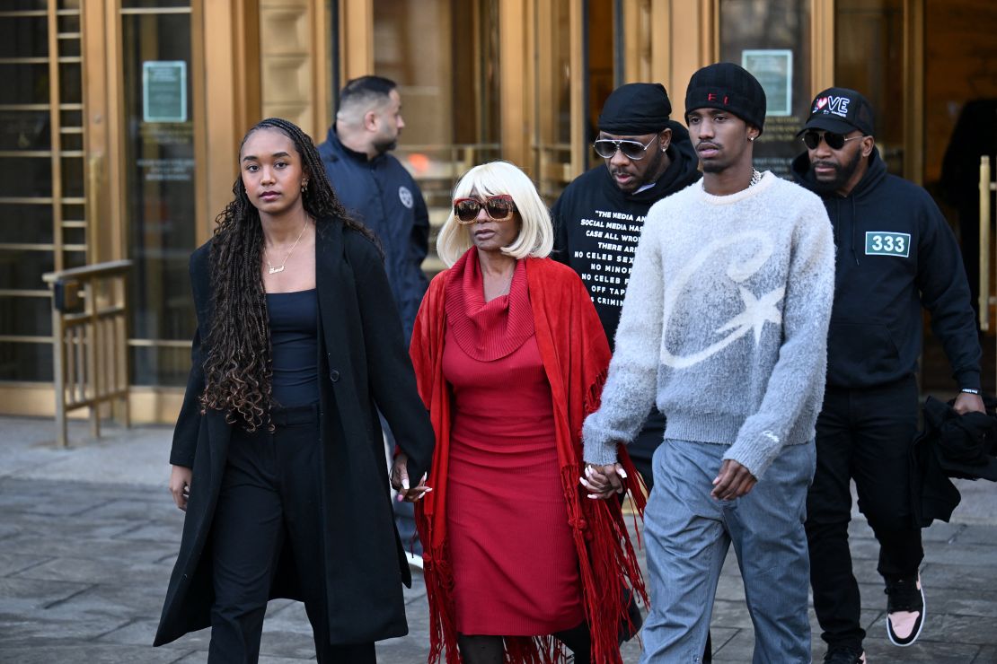 Sean 'Diddy' Combs' children Chance Combs (left) and Christian Combs (right) and his mother Janice Combs (center) depart a pre-trial hearing at the Southern District of New York Federal Court in New York on March 14, 2025.