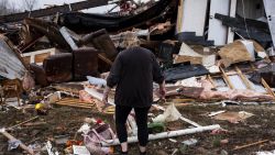 POPLAR BLUFF, MISSOURI - MARCH 15: Denise Woodard looks over her destroyed trailer inside of Harmony Hills trailer park on March 15, 2025 in Poplar Bluff, Missouri. Many homes throughout Harmony Hills were damaged by the severe weather on Friday night that left one person dead in Butler County, Missouri. At least 19 people have reportedly been killed after tornadoes and severe storms hit several midwest and southern states overnight. (Photo by Brad Vest/Getty Images)