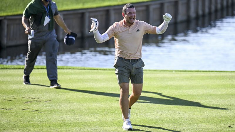 Alejandro Tosti jumps in water at The Players Championship after making hole-in-one