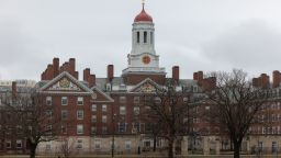 CAMBRIDGE, MASSACHUSETTS - MARCH 17: A person runs past Dunster House at Harvard University on March 17, 2025 in Cambridge, Massachusetts. Harvard University announced free tuition for students from families that make under $200K a year. (Photo by Scott Eisen/Getty Images)