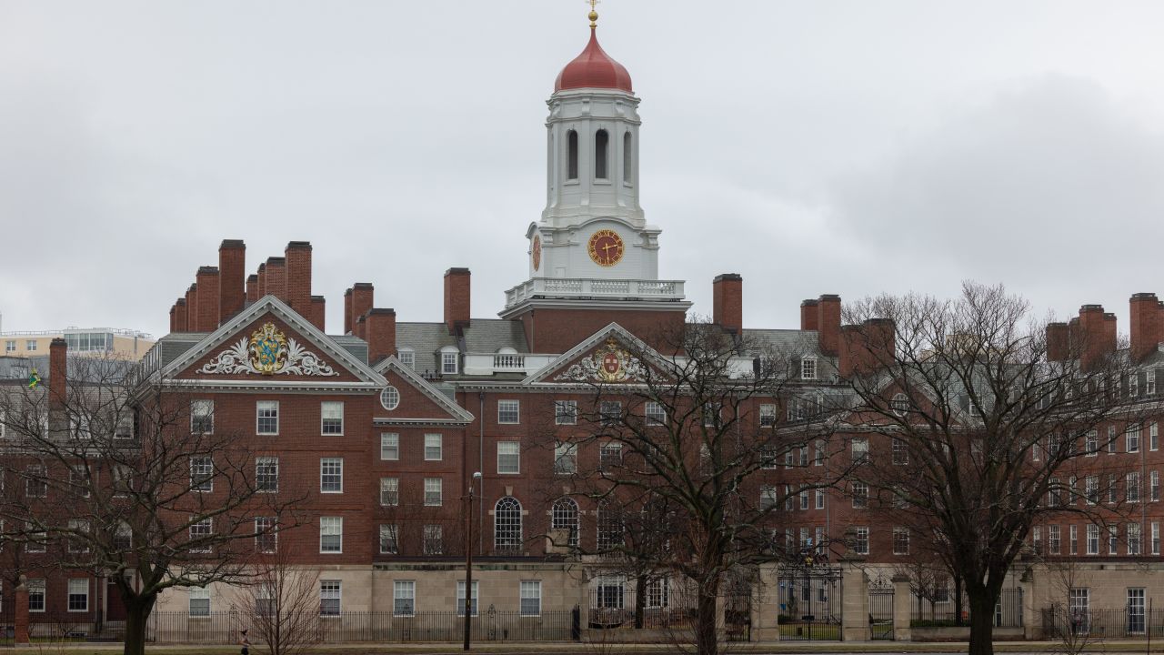 CAMBRIDGE, MASSACHUSETTS - MARCH 17: A person runs past Dunster House at Harvard University on March 17, 2025 in Cambridge, Massachusetts. Harvard University announced free tuition for students from families that make under $200K a year. (Photo by Scott Eisen/Getty Images)