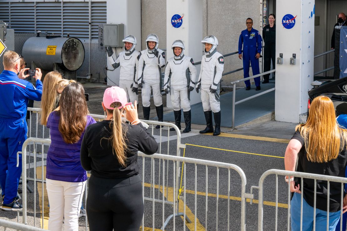 NASA astronauts commander Anne McClain and pilot Nichole Ayers, alongside mission specialists JAXA astronaut Takuya Onishi and Roscosmos cosmonaut Kirill Peskov, are seen here ahead of launch on Friday.