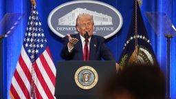 WASHINGTON, DC - MARCH 14: U.S. President Donald Trump gestures while speaking at the Justice Department March 14, 2025 in Washington, DC. As he has used the department to punish enemies, Trump is expected to deliver what the White House calls a law-and-order speech and outline steps he will take to counter “weaponization” of the department. (Photo by Andrew Harnik/Getty Images)