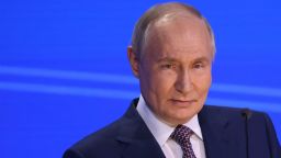 Russian President Vladimir Putin gestures during the plenary session of Russia Union of Industrialists and Entrepreneurs, March 18, 2025, in Moscow, Russia. Putin visited an annual congress of top Russian business prior to his telephone talks with U.S. President Donald Trump.