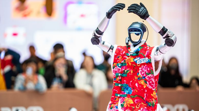 A humanoid robot from Chinese firm Unitree dances during an AI technology show in Hong Kong on March 15, 2025.