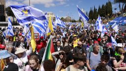 Protesters take part in a demonstration against Israel's Prime Minister Benjamin Netanyahu in Jerusalem on March 19, 2025, calling for an end to the war in Gaza. Israel on March 19 launched its most intense strikes on the Gaza Strip since a January 19 ceasefire with Palestinian militant group Hamas ended more than 15 months of war. (Photo by Menahem KAHANA / AFP) (Photo by MENAHEM KAHANA/AFP via Getty Images)          