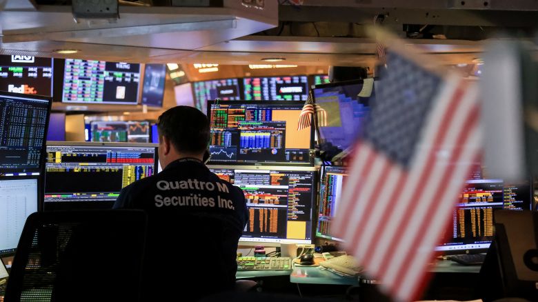 A trader works on the floor of the New York Stock Exchange (NYSE) in New York, US, on Wednesday, March 19, 2025. Federal Reserve officials held their benchmark interest rate steady for a second straight meeting, though they telegraphed expectations for slower economic growth and higher inflation. Photographer: Michael Nagle/Bloomberg via Getty Images