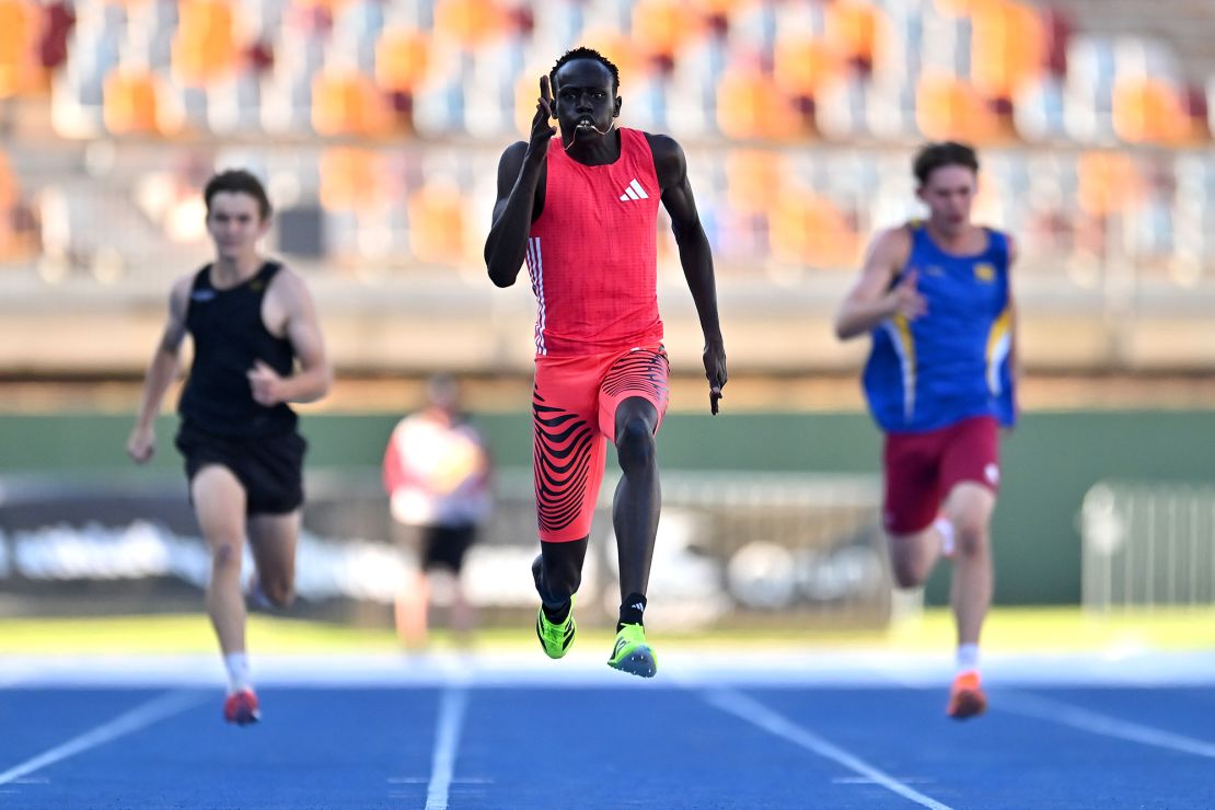 Gout races clear of the competition in the under-20 200m final.