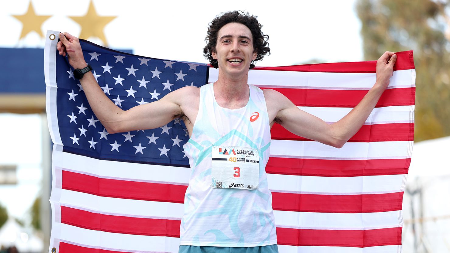Matt Richtman of the United States celebrates after crossing the finish line and winning the 2025 Los Angeles Marathon at Westfield Century City on Sunday.