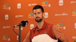 Novak Djokovic talks to the media at the Miami Open in Miami Gardens, Florida, on March 20, 2025.