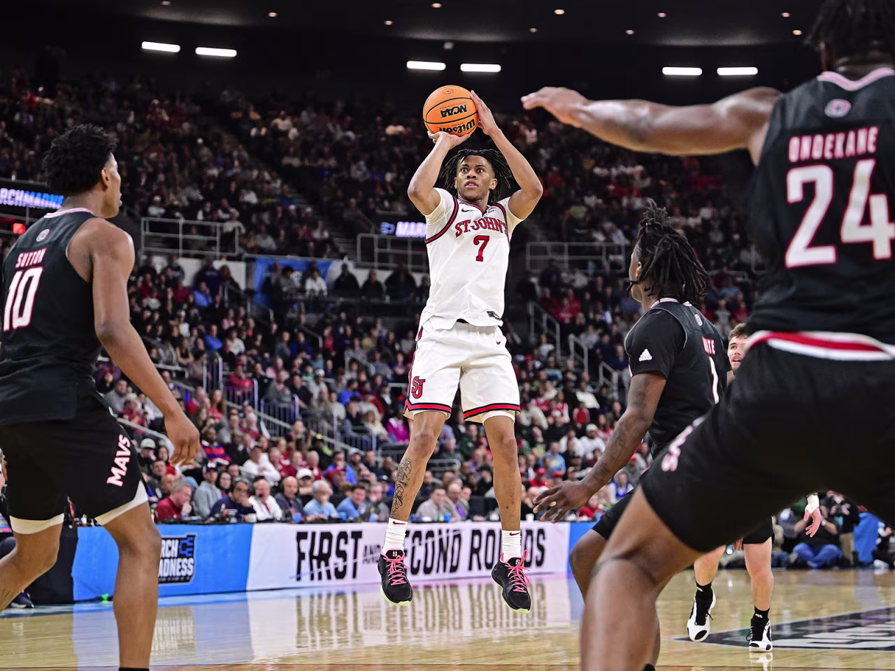 Simeon Wilcher #7 of the St. John's Red Storm takes a shot during the 2025 NCAA Men's Basketball Tournament against Omaha Mavericks, in Providence, Rhode Island on Thursday.