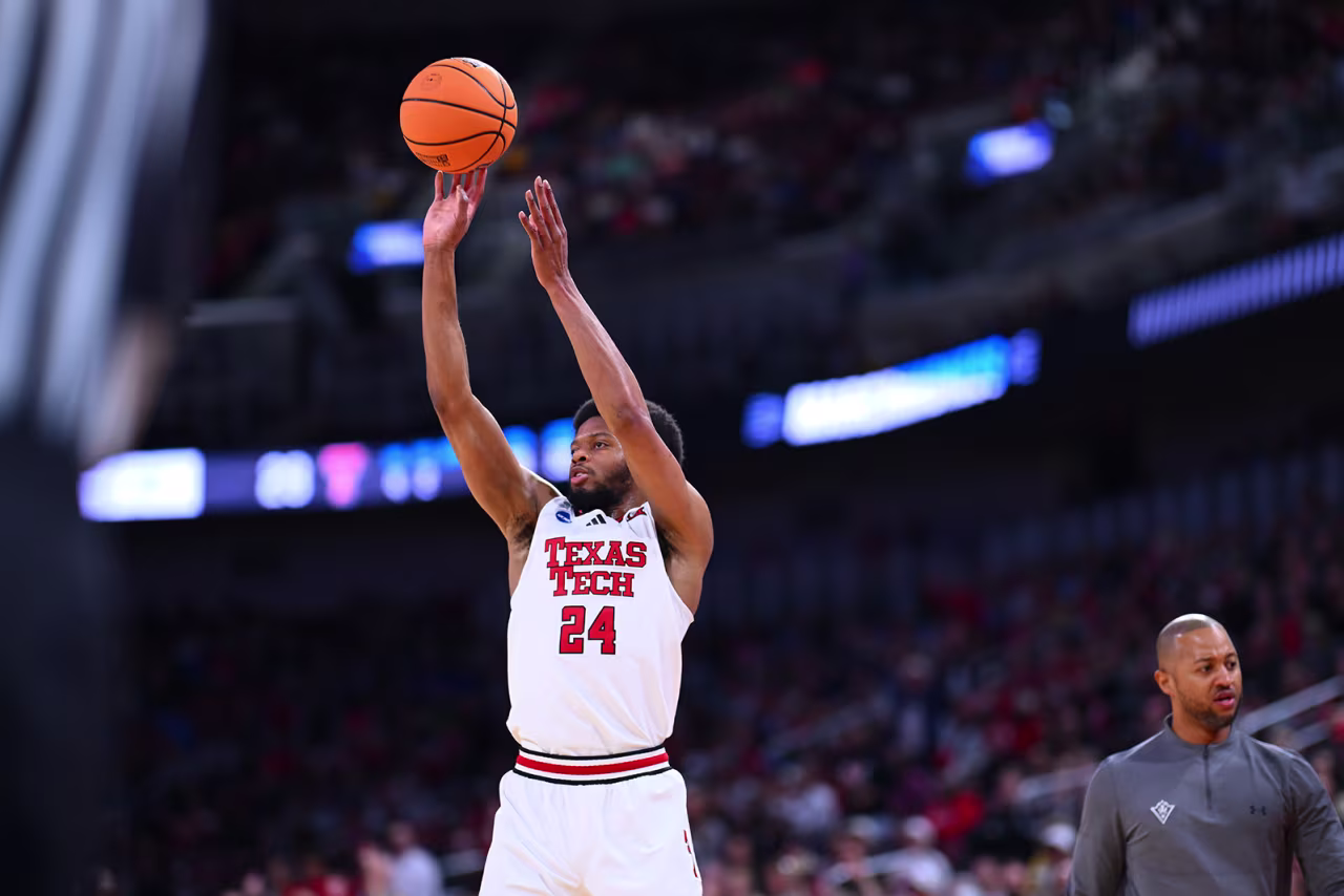 Kerwin Walton #24 of the Texas Tech Red Raiders shoots for three against North Carolina-Wilmington Seahawks during the 2025 NCAA Men's Basketball Tournament in Wichita, Kansas on Thursday.