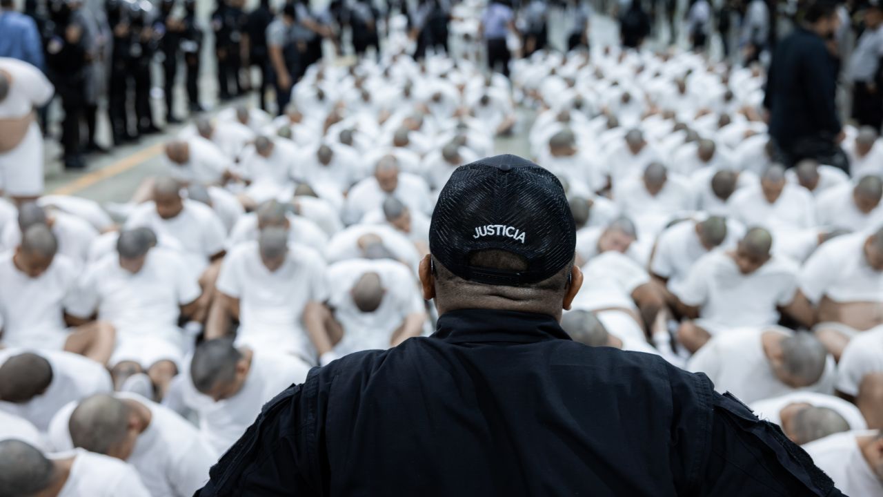 TECOLUCA, EL SALVADOR - MARCH 16: In this handout photo provided by the Salvadoran government,  a guard watches the inmates allegedly linked to criminal organizations sitting on the floor at CECOT on March 16, 2025 in Tecoluca, El Salvador. Trump's istration deported 238 alleged  of the Venezuelan criminal organizations 'Tren De Aragua' and Mara Salvatrucha with only 23 being  of the Mara. Nayib Bukele president of El Salvador announced that his government will receive the alleged  of the gang to be taken to CECOT. On February of 2023 El Salvador inaugurated Latin America's largest prison as part of President Nayib Bukele's plan to fight gangs. (Photo by Salvadoran Government via Getty Images)