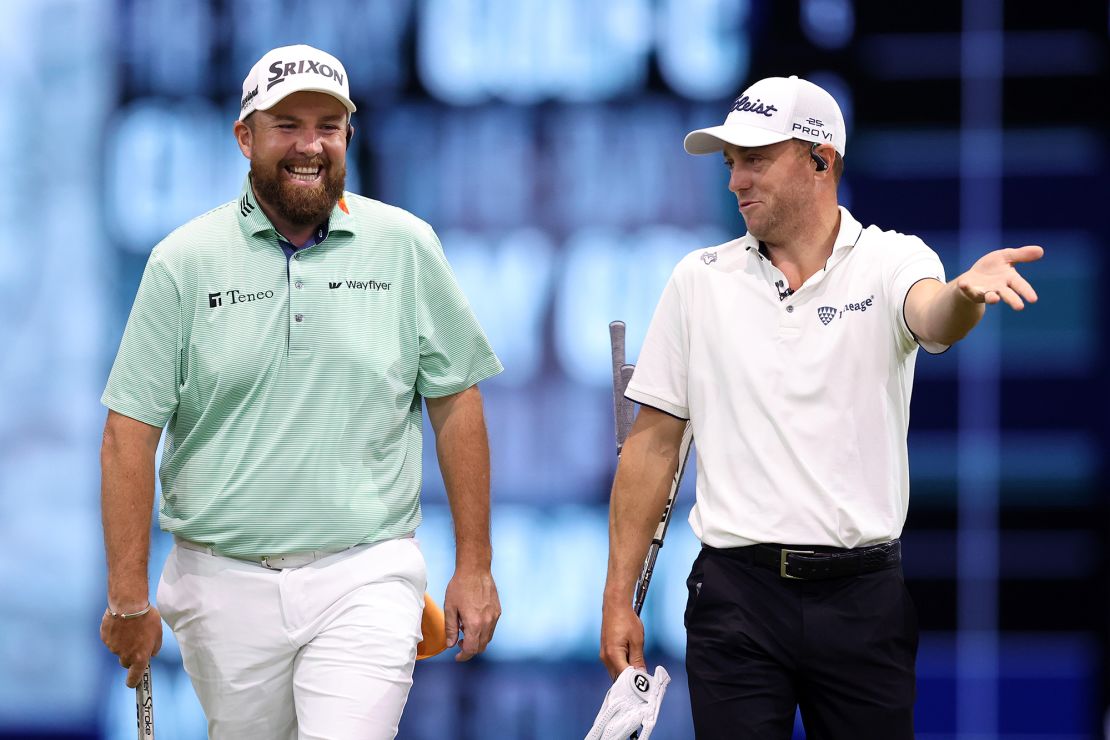 Thomas (right) jokes with Lowry (left) during Tuesday's TGL semifinal.