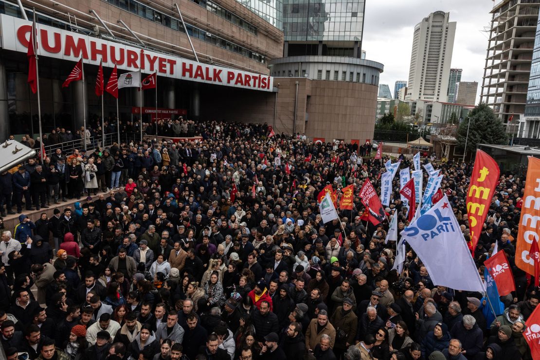 People gather in front of the CHP Headquarters protesting the detention of CHP Istanbul Mayor Ekrem Imamoglu in Ankara, Turkey on Wednesday.