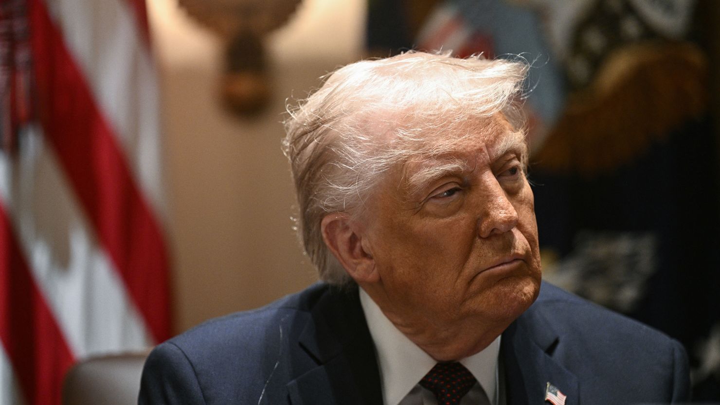 President Donald Trump looks on during a cabinet meeting in March 2025.