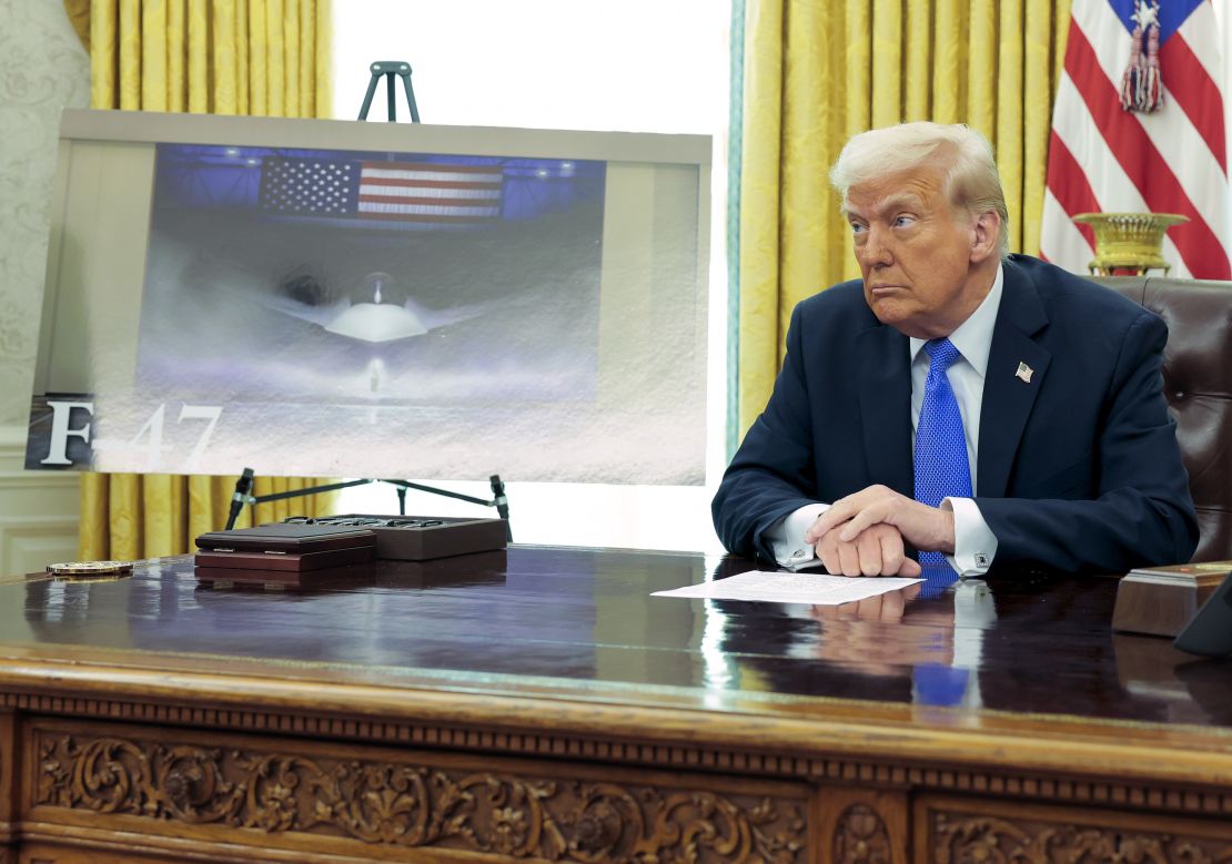 Trump delivers remarks in the Oval Office of the White House on March 21, 2025 in Washington, DC. Trump announced the Next-Generation Air Dominance (NGAD) program, the F-47, the sixth-generation high-tech Air Force fighter to succeed the F-22 Raptor.