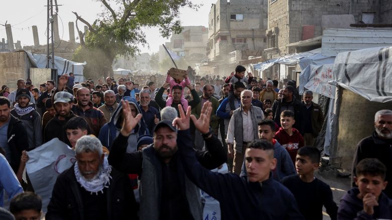 Palestinians attend a rally calling for an end to the war in Beit Lahia, Gaza.