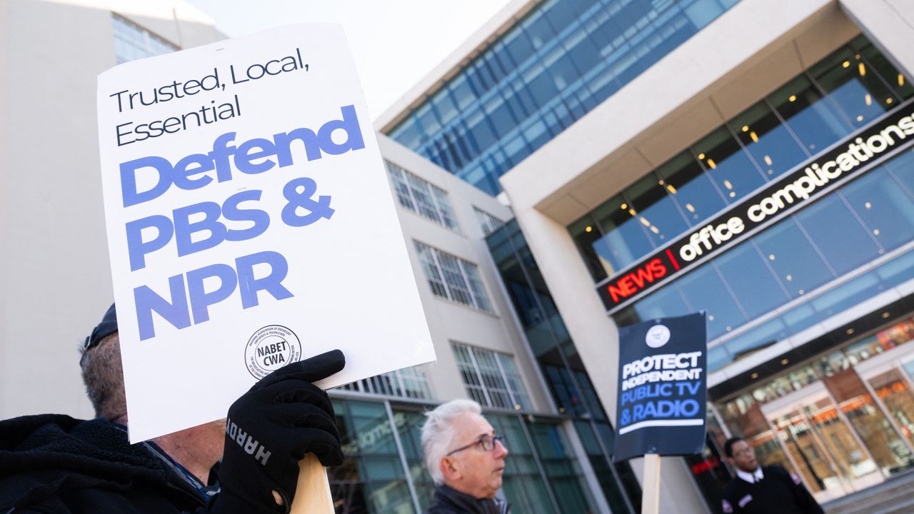 People participate in a rally to call on Congress to protect funding for US public broadcasters, Public Broadcasting Service (PBS) and National Public Radio (NPR), outside the NPR headquarters in Washington, DC, on March 26, 2025. President Donald Trump said on March 25 that he would "love" to cut funding for the US public broadcasters, which reportedly will be reviewed by Elon Musk's Department of Government Efficiency this week.