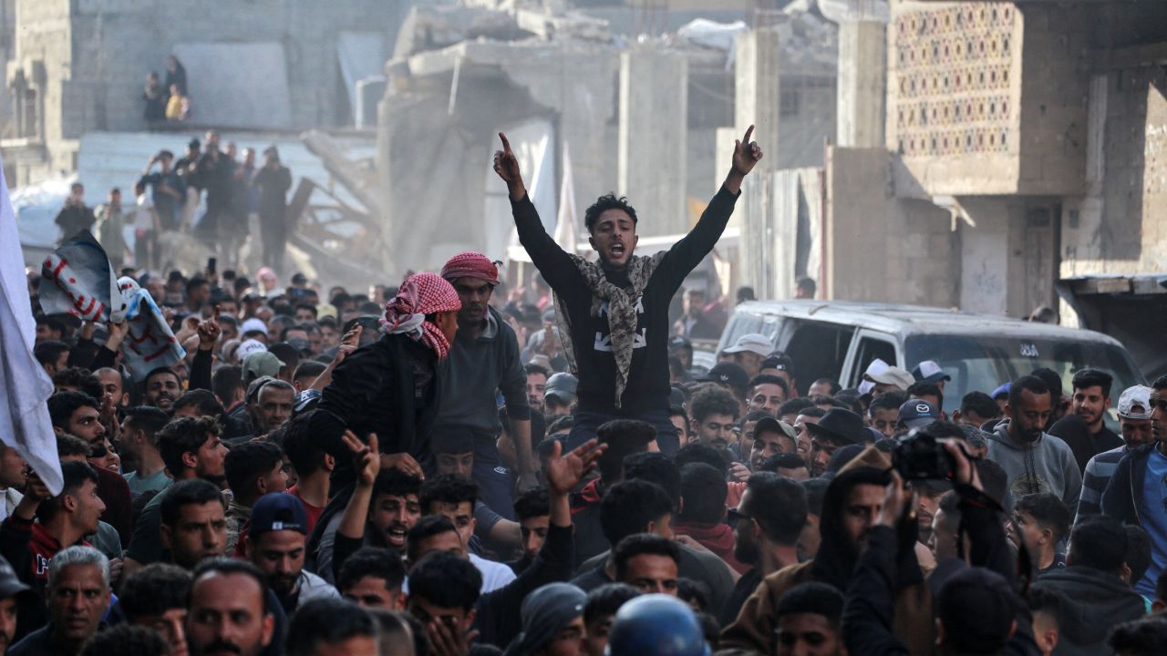 CORRECTION / Palestinians take part in an anti-Hamas protest, calling for an end to the war with Israel, in Beit Lahia in the northern Gaza Strip on March 26, 2025. Demonstrators carrying banners were seen marching in Gaza City and the town of Beit Lahia in the north of the territory, more than a week after the Israeli army resumed its bombing campaign following nearly two months of a truce. (Photo by AFP) / "The erroneous mention[s] appearing in the metadata of this photo by - has been modified in AFP systems in the following manner: [on March 26, 2025] instead of [on April 26, 2025]. Please immediately remove the erroneous mention[s] from all your online services and delete it (them) from your servers. If you have been authorized by AFP to distribute it (them) to third parties, please ensure that the same actions are carried out by them. Failure to promptly comply with these instructions will entail liability on your part for any continued or post notification usage. Therefore we thank you very much for all your attention and prompt action. We are sorry for the inconvenience this notification may cause and remain at your disposal for any further information you may require." (Photo by -/AFP via Getty Images)          