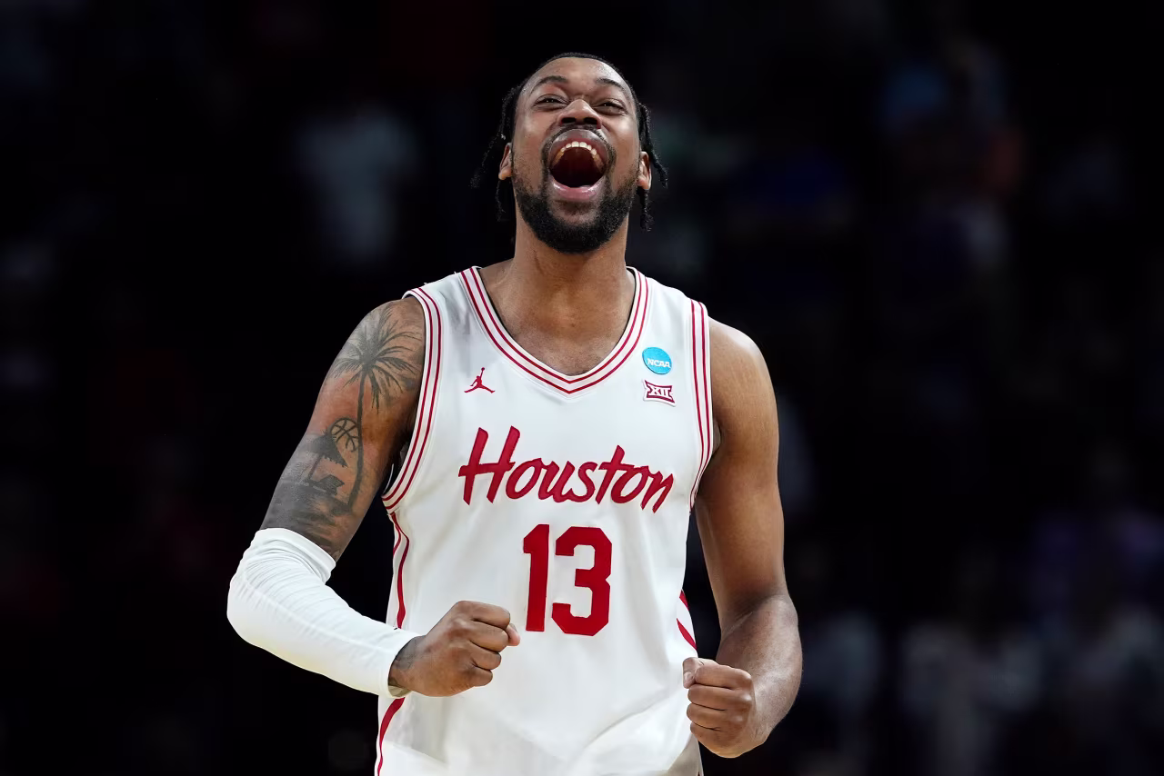 Houston forward  J'Wan Roberts celebrates after defeating Gonzaga.