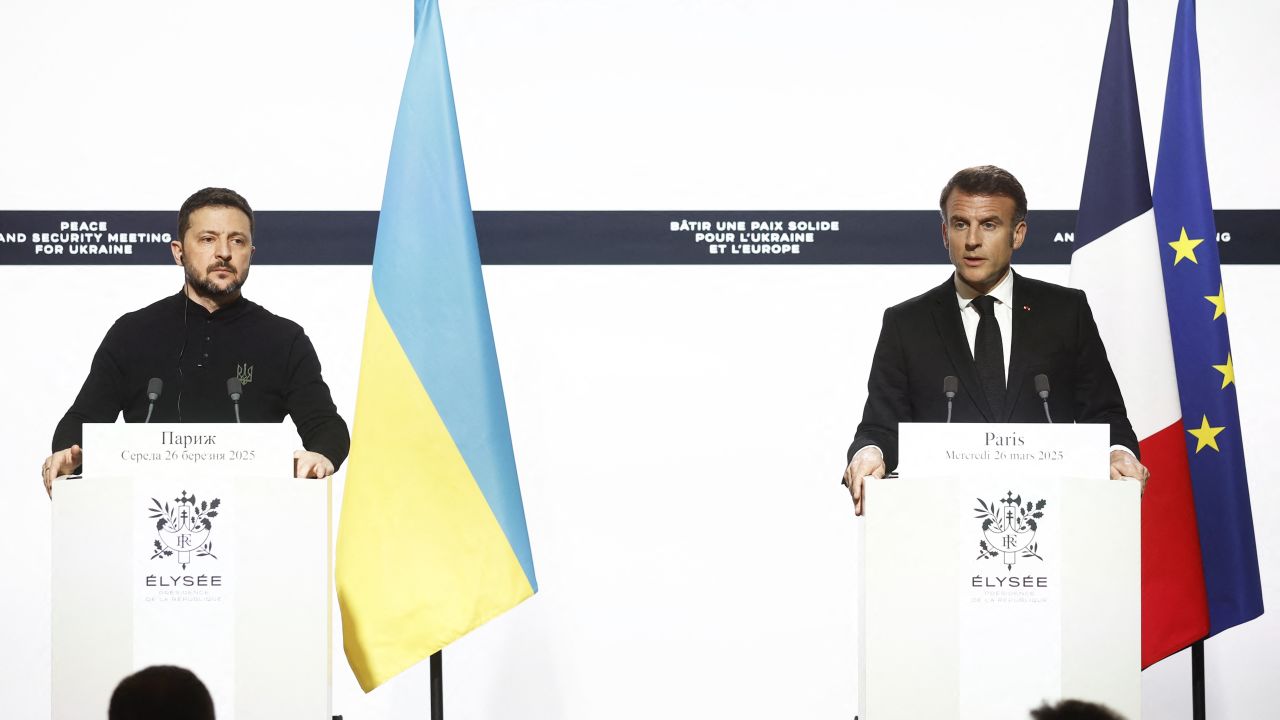 's President Emmanuel Macron (R) and Ukraine's President Volodymyr Zelensky hold a press conference at the Elysee Palace in Paris on March 26, 2025 following their meeting to prepare for the summit with the 'coalition of the willing'. The summit of the "coalition of the willing" is held in Paris on March 27, 2025. (Photo by Yoan VALAT / POOL / AFP) (Photo by YOAN VALAT/POOL/AFP via Getty Images)          