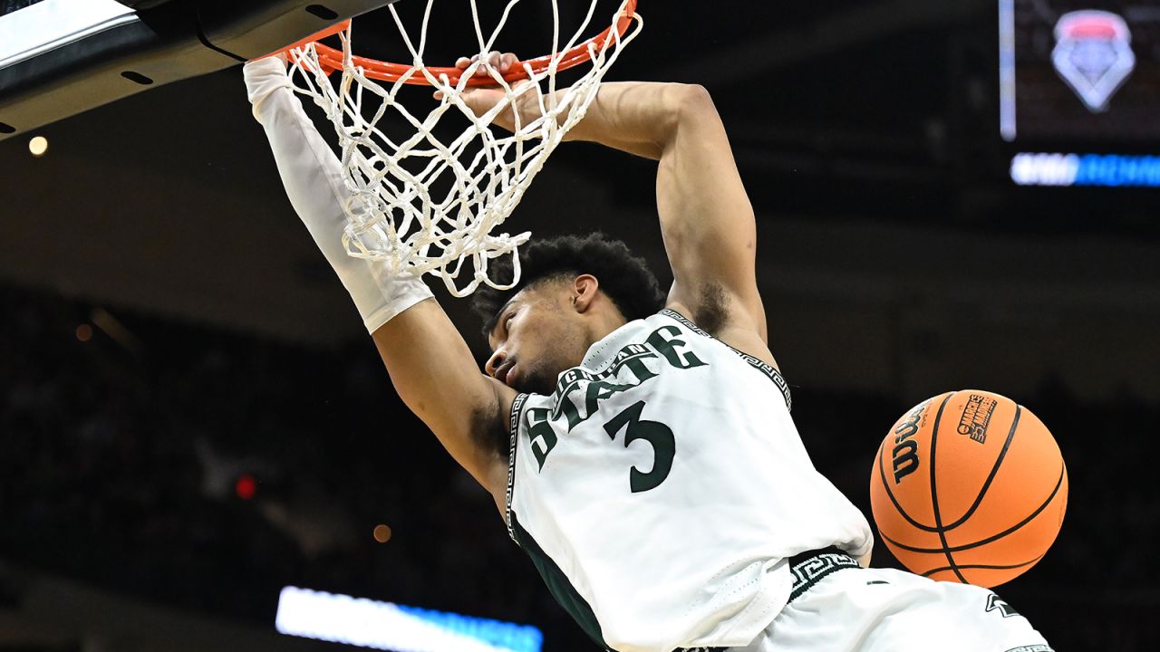 Jaden Akins #3 of the Michigan State Spartans dunks the ball against the New Mexico Lobos during the first half in the second round of the NCAA Men's Basketball Tournament at Rocket Mortgage Fieldhouse in Cleveland, Ohio, on Sunday March 23, 2025.