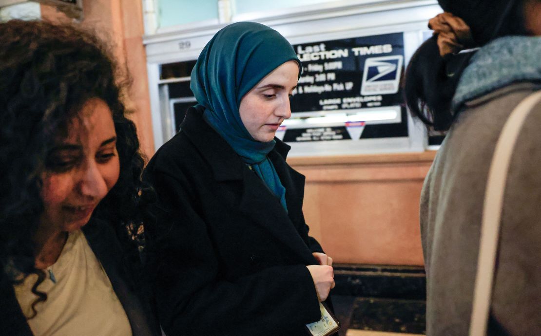 Mahmoud Khalil's wife Noor Abdalla, center, leaves after a hearing in Newark, New Jersey, on Friday.