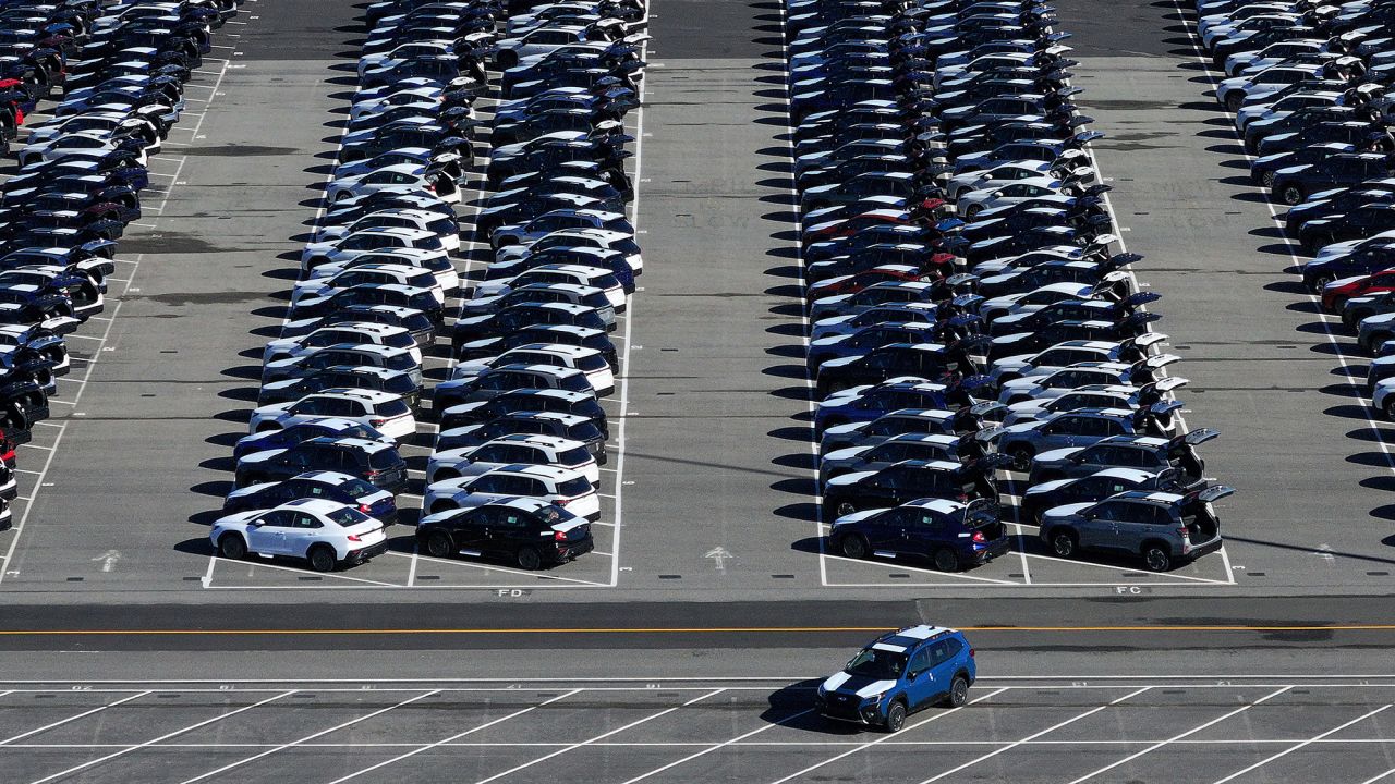 In an aerial view, brand new Subaru cars sit in a storage lot at Auto Warehouse Co. on March 24, 2025 in Richmond, California. Japanese automaker Subaru issued a dealer bulletin to all Subaru retailers saying it could no longer guarantee 2025 Subaru pricing as the Trump administration says it will place a 25 percent tariff on products from Canada and Mexico.