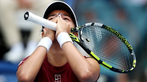MIAMI GARDENS, FLORIDA - MARCH 26:  Alexandra Eala of the Philippines reacts at match point after defeating Iga Swiatek of Poland on Day 9 of the Miami Open at Hard Rock Stadium on March 26, 2025 in Miami Gardens, Florida. (Photo by Al Bello/Getty Images)