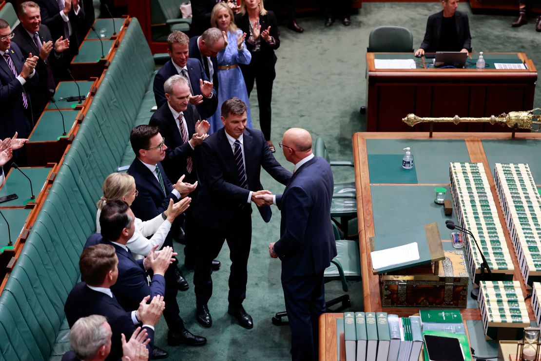Peter Dutton shakes hands with Angus Taylor after delivering the Budget Reply at Parliament House in Canberra, Australia, on March 27.