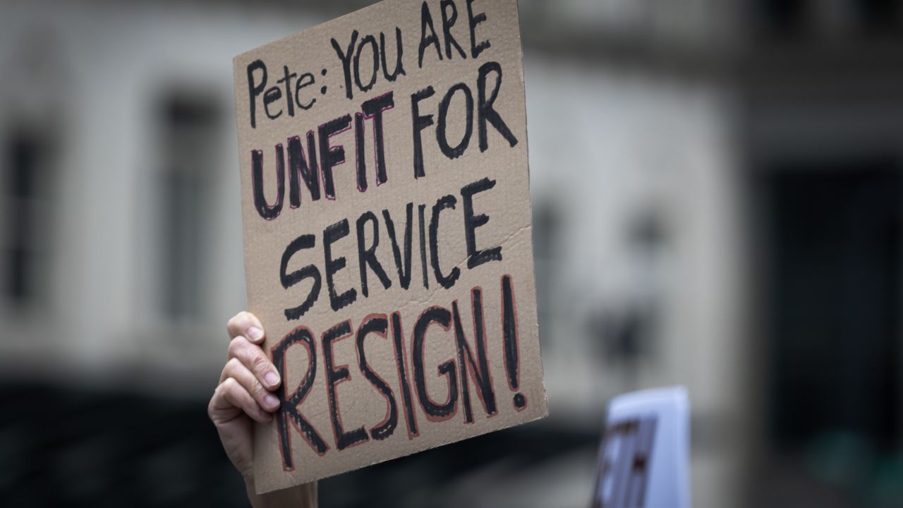 CHICAGO, ILLINOIS - MARCH 27: Military veterans and family  of active-duty troops gather in the Loop to call for the resignation of Defense Secretary Pete Hegseth on March 27, 2025 in Chicago, Illinois. Hegseth’s qualifications as defense secretary are being questioned after he shared details about an impending military attack on Signal, a public group-chat app, with a reporter from The Atlantic and other White House officials including Vice President JD Vance. When news of the security breach broke, Hegseth, who worked at Fox News before ing Trump’s cabinet, responded by attacking the credibility of the journalist and the publication.  (Photo by Scott Olson/Getty Images)