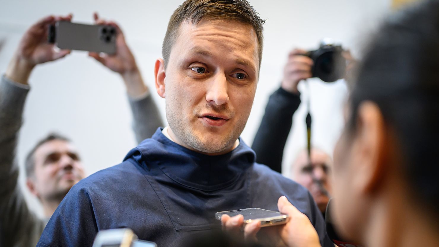 Jens-Frederik Nielsen, the leader of the Demokraatit party and the next Prime Minister of Greenland, speaks with journalists on March 28, 2025 in Nuuk, Greenland.