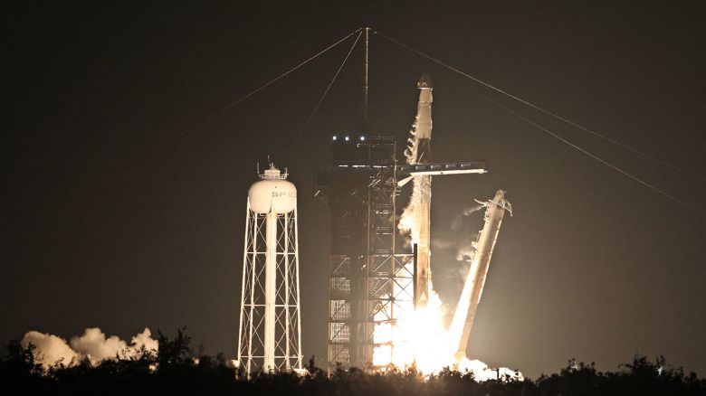 A SpaceX Falcon 9 rocket with the Fram2 mission astronauts aboard lifts off from launch pad 39A at the Kennedy Space Center in Cape Canaveral, Florida on March 31, 2025. Launching aboard SpaceX's Crew Dragon capsule Resilience, the Fram2 mission will be the first human spaceflight ever to cruise over Earth's polar regions. The flight is being funded privately by Chinese-born entrepreneur Chun Wang, who will serve as mission commander. The rest of the international crew are vehicle commander Jannicke Mikkelsen of Norway, pilot Rabea Rogge of Germany and mission specialist and medical officer Eric Philips of Australia. Their flight also marks the sixth private astronaut mission by SpaceX. (Photo by Gregg Newton / AFP) (Photo by GREGG NEWTON/AFP via Getty Images)          