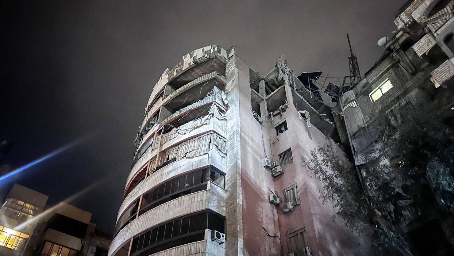 This picture taken early on April 1, 2025 shows a damaged building after an Israeli strike in southern Beirut.