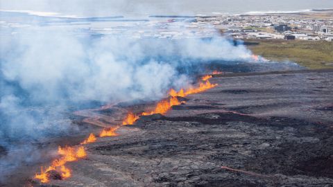 Molten lava is seen coming out of a fissure on the outskirts of the fishing village Grindavik in southwest Iceland, on April 1, 2025. The Icelandic Meteorological Office (IMO) said "an eruption has started on the Sundhnuksgigar Crater Row" north of the fishing village Grindavik that was evacuated Tuesday after lava began spewing from a volcanic eruption, the eighth to hit the region since the end of 2023. (Photo by Ael Kermarec / AFP) (Photo by AEL KERMAREC/AFP via Getty Images)          