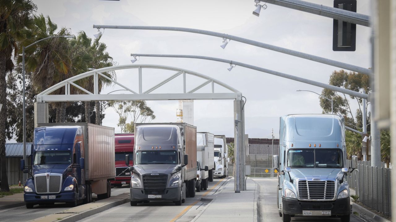 Trucks coming from Mexico enter the United States to an inspection station after crossing the border in Otay Mesa, California, on April 1, 2025. US President Donald Trump kept the world's leading economies on edge on April 1, 2025 as he made final preparations for a "Liberation Day" announcement of sweeping new tariffs that could trigger a global trade war. Trump has promised to be "very kind" when he unveils the so-called reciprocal tariffs on Wednesday, but uncertainty reigned over which countries would be targeted and by how much. (Photo by SANDY HUFFAKER / AFP) (Photo by SANDY HUFFAKER/AFP via Getty Images)          