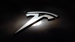 This photograph shows a Tesla logo on a car in Lyon on April 2, 2025.