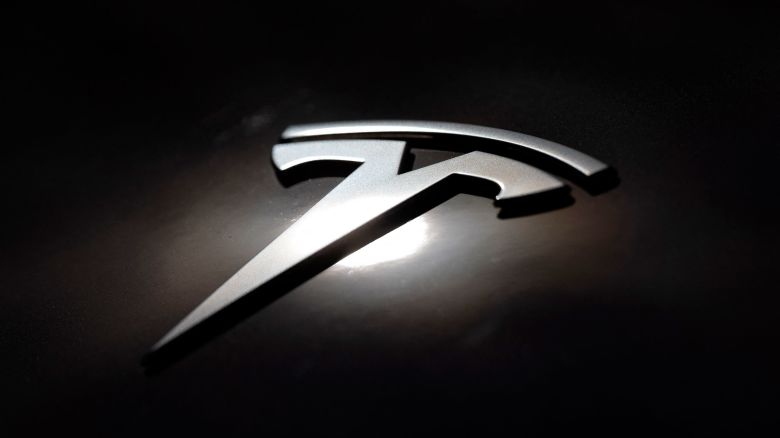 This photograph shows a Tesla logo on a car in Lyon on April 2, 2025.