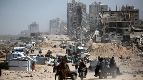 People commute along the al-Rashid road, the only route linking the northern and southern parts of the Palestinian territory, on April 2, 2025. Israeli Prime Minister Benjamin Netanyahu said on April 2 that the military was "dissecting" the Gaza Strip and seizing territory to pressure Hamas into freeing hostages still held in the territory. (Photo by Bashar TALEB / AFP) (Photo by BASHAR TALEB/AFP via Getty Images)