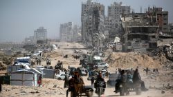 People commute along the al-Rashid road, the only route linking the northern and southern parts of the Palestinian territory, on April 2, 2025. Israeli Prime Minister Benjamin Netanyahu said on April 2 that the military was "dissecting" the Gaza Strip and seizing territory to pressure Hamas into freeing hostages still held in the territory. (Photo by Bashar TALEB / AFP) (Photo by BASHAR TALEB/AFP via Getty Images)          