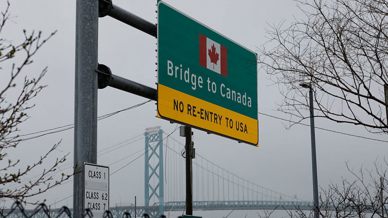 Trucks cross the Ambassador Bridge to Detroit, Michigan, on April 2, 2025. The Ambassador Bridge that connects Detroit with Windsor, Canada. US President Donald Trump is poised to unveil sweeping new "Liberation Day" tariffs on April 2, 2025, but kept the world guessing until the last minute about the scope of an onslaught that could spark a global trade war. Trump will roll out the measures flanked by cabinet  in the Rose Garden of the White House at 4:00 pm (2000 GMT), promising that they will stop America being "ripped off" and will deliver a new "golden age" of US industry. (Photo by JEFF KOWALSKY / AFP) (Photo by JEFF KOWALSKY/AFP via Getty Images)          
