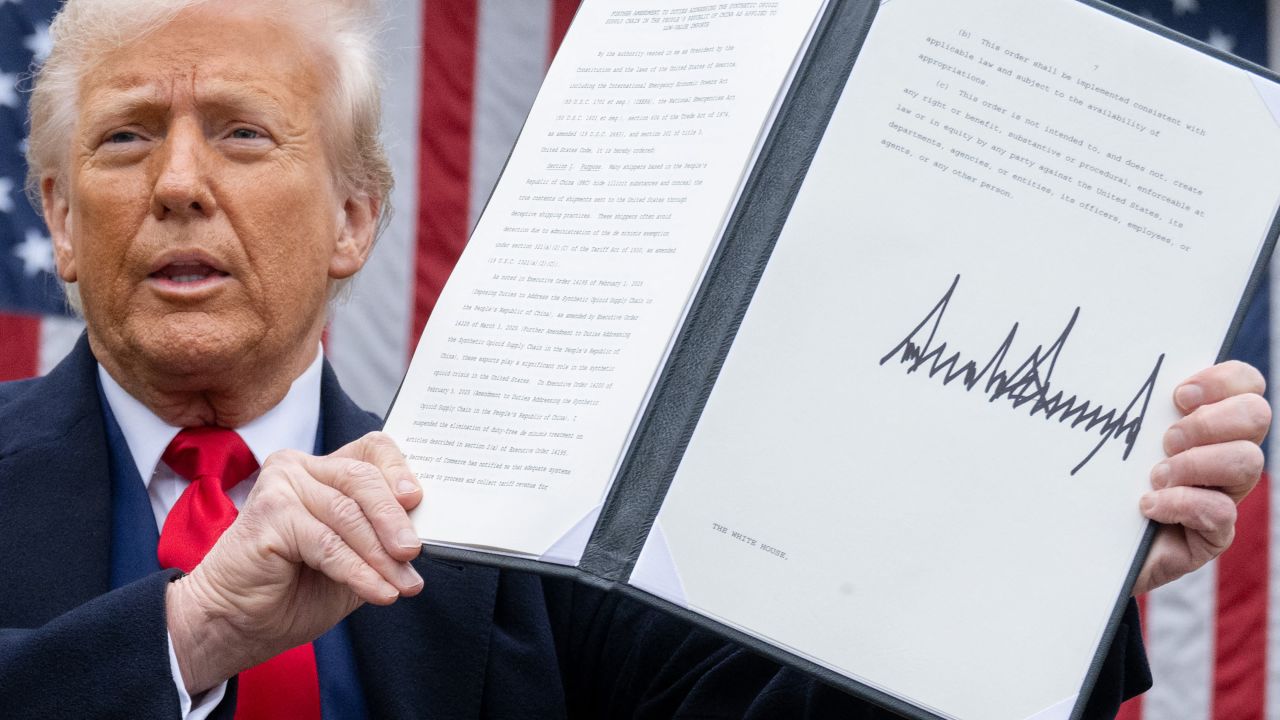 US President Donald Trump holds a signed executive order after delivering remarks on reciprocal tariffs during an event in the Rose Garden entitled "Make America Wealthy Again" at the White House in Washington, DC, on April 2, 2025. Trump geared up to unveil sweeping new "Liberation Day" tariffs in a move that threatens to ignite a devastating global trade war. Key US trading partners including the European Union and Britain said they were preparing their responses to Trump's escalation, as nervous markets fell in Europe and America. (Photo by SAUL LOEB / AFP) (Photo by SAUL LOEB/AFP via Getty Images)          