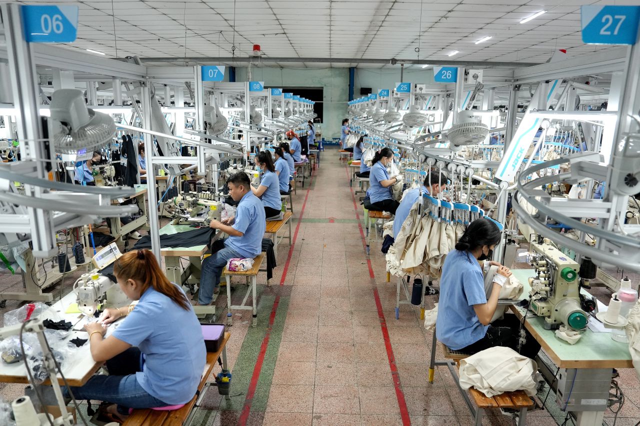 Vietnamese garment factory workers stitch apparels at a factory in Ho Chi Minh City on April 3rd.