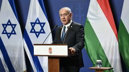 Israeli Prime Minister Benjamin Netanyahu speaks during a press conference with Hungary's Prime Minister (unseen) after bilateral talks on April 3, 2025 in Budapest, Hungary. Israeli Prime Minister Benjamin Netanyahu arrived in Hungary in defiance of the International Criminal Court (ICC)'s arrest warrant against him over alleged war crimes in Gaza. Hungary has long-standing ties with Israel, and they been further bolstered up since the start of the war in Gaza, sparked by the Palestinian militant group Hamas's attack on October 7, 2023. (Photo by Attila KISBENEDEK / AFP) (Photo by ATTILA KISBENEDEK/AFP via Getty Images)          