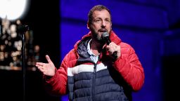 Adam Sandler performs onstage during the 2025 Night of Too Many Stars benefiting NEXT for AUTISM on March 31, 2025 in New York City.