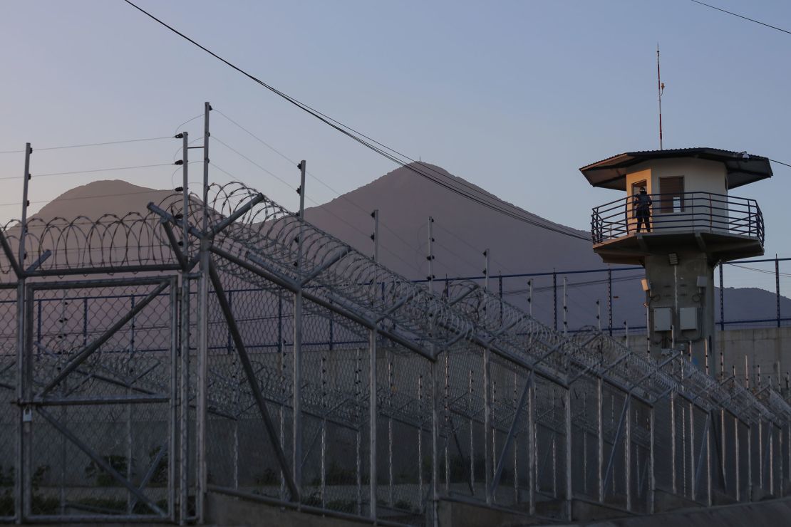 A prison officer stands guard in the watchtower at CECOT (Center for the Compulsory Housing of Terrorism) in Tecoluca, San Vicente, El Salvador, on April 4.